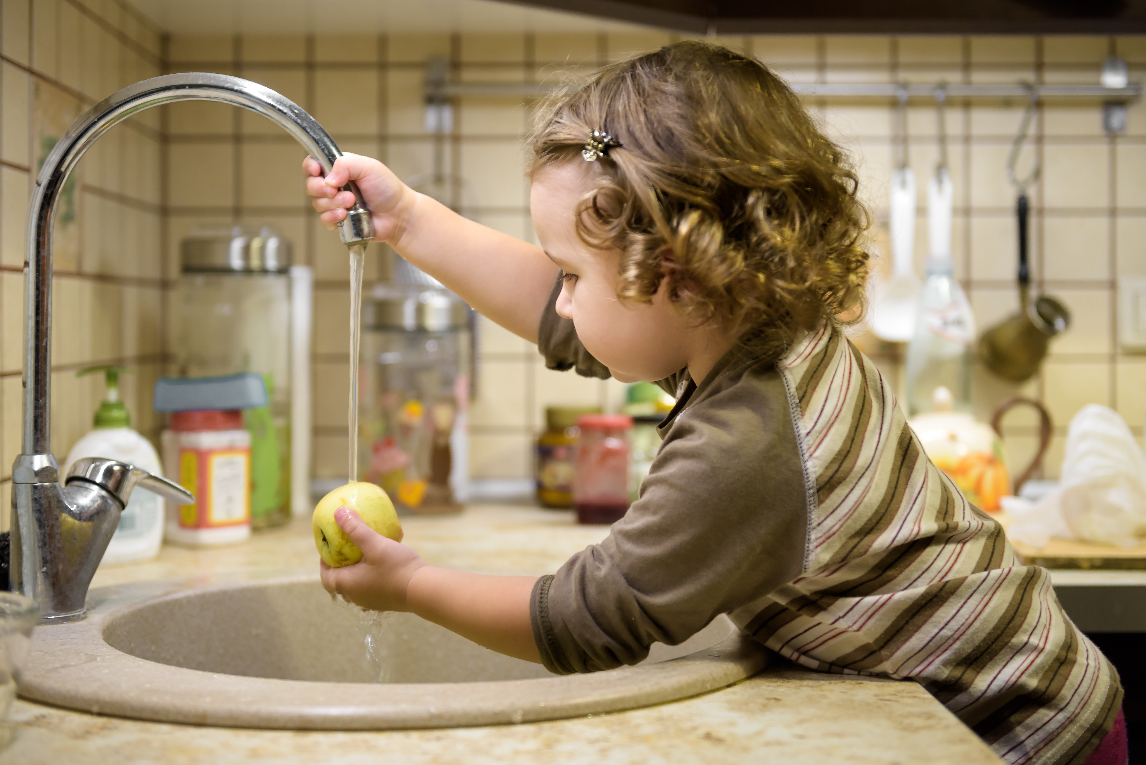 Child using sink