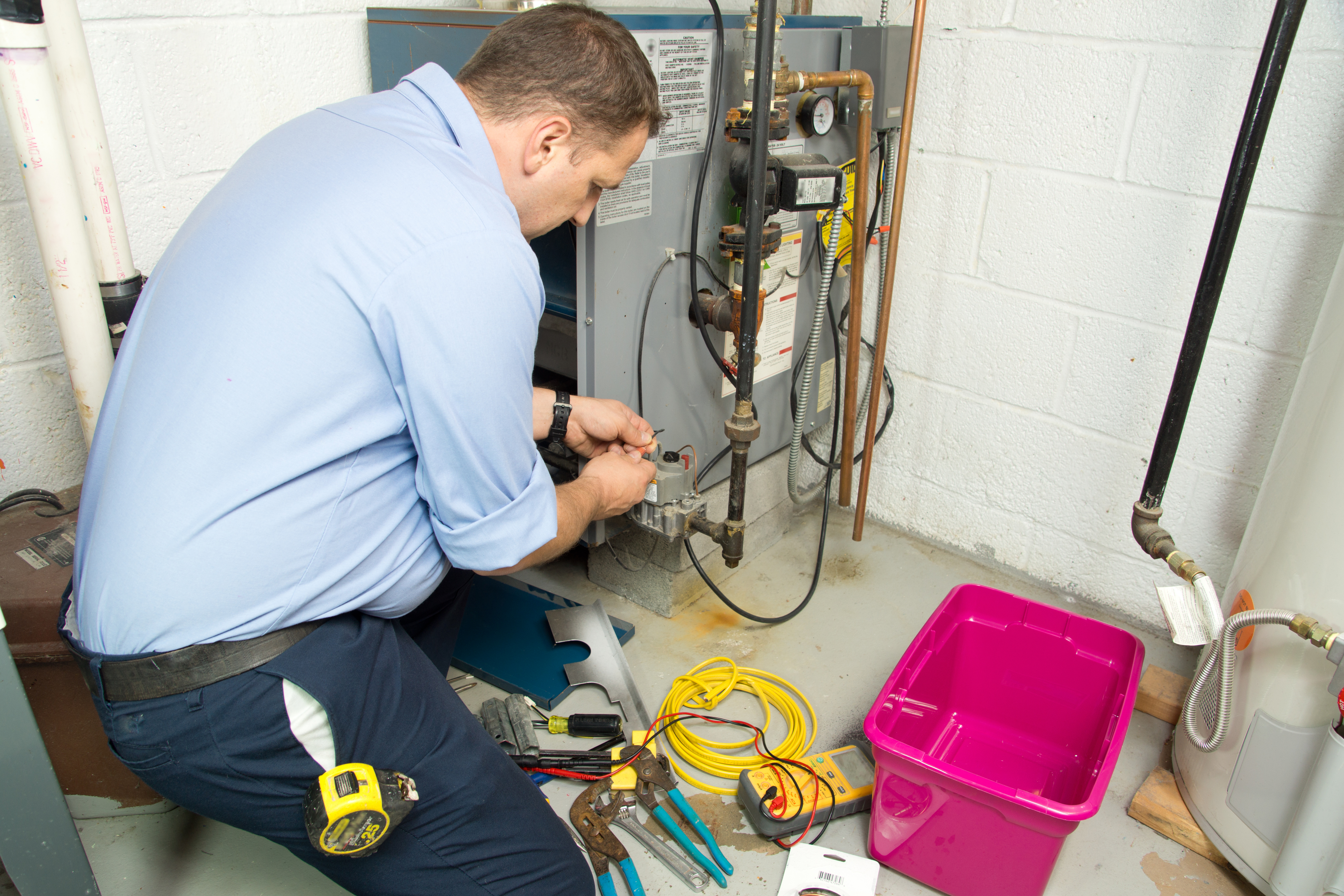 Plumber working on plumbing